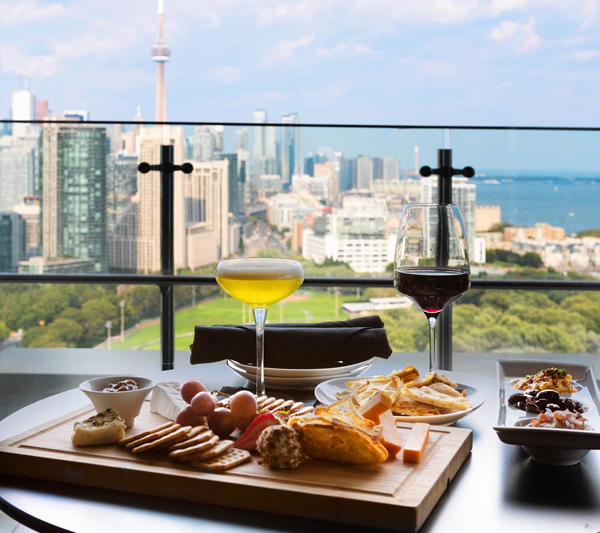 Best Rooftop Patios In Toronto To Add To Your Summer Checklist